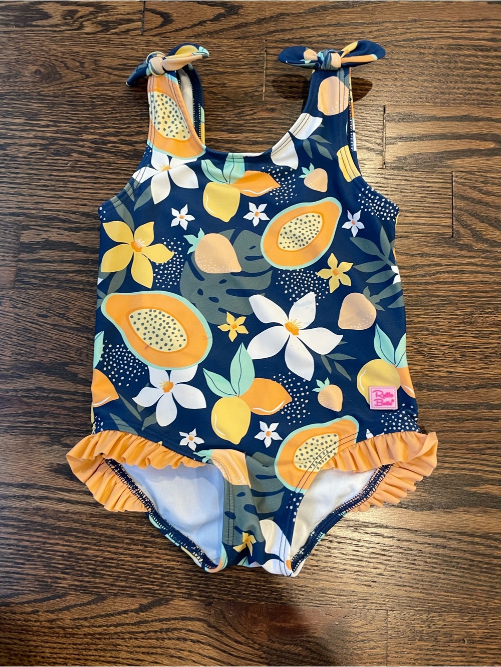 Ruffle Butts Navy Tropical Fruit Ruffle One-Piece Swimsuit